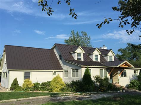 dark bronze metal roof white house|white house with galvalume roof.